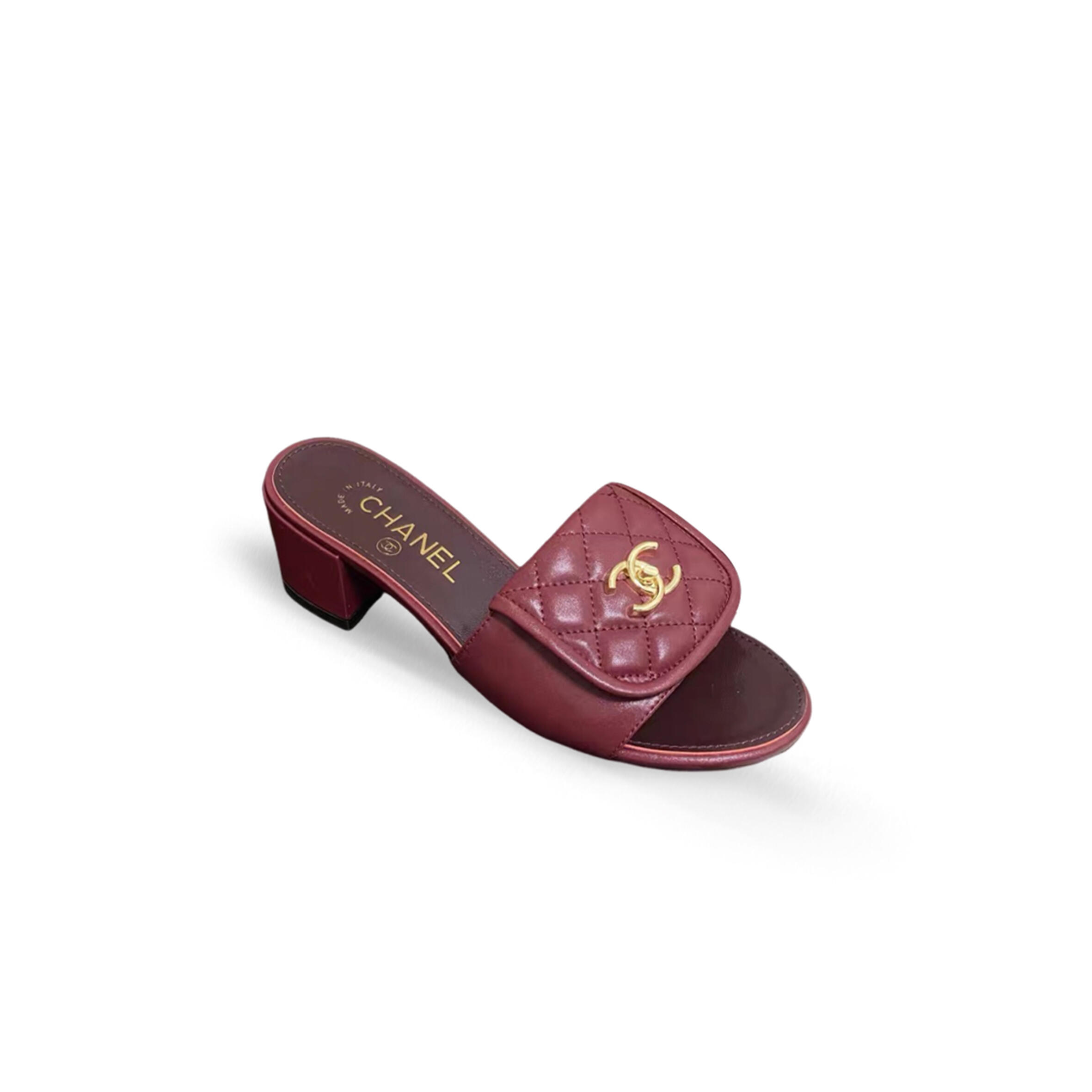 Ch**el lambskin quilted turnlock slippers mules